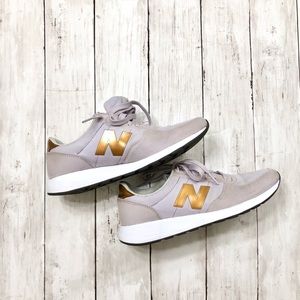 New Balance lavender & gold sneakers